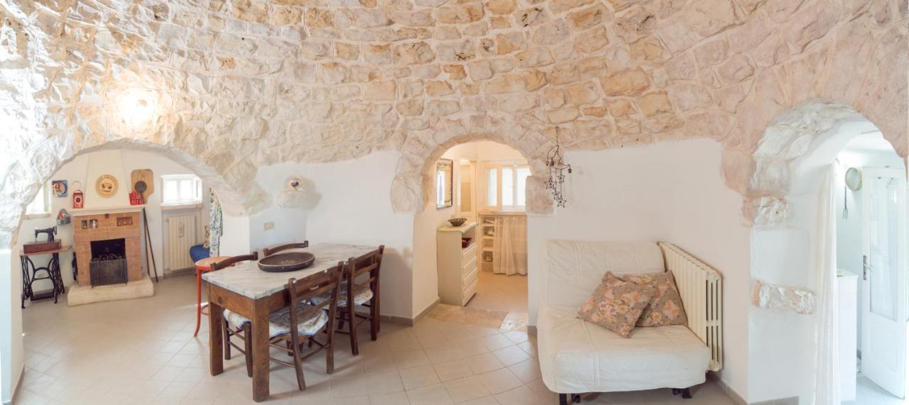 Trulli Girasoli E Viole Cocolicchio Extérieur photo