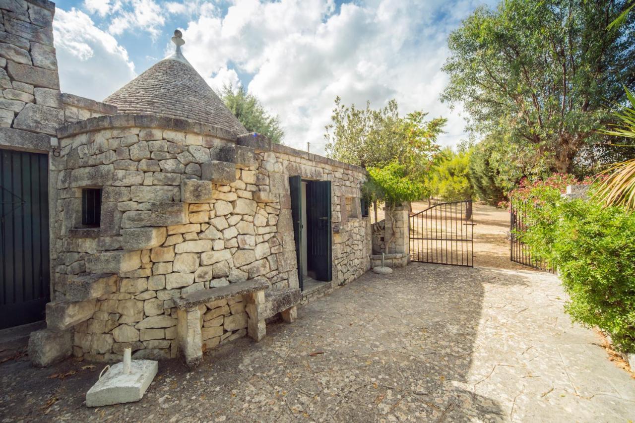 Trulli Girasoli E Viole Cocolicchio Extérieur photo