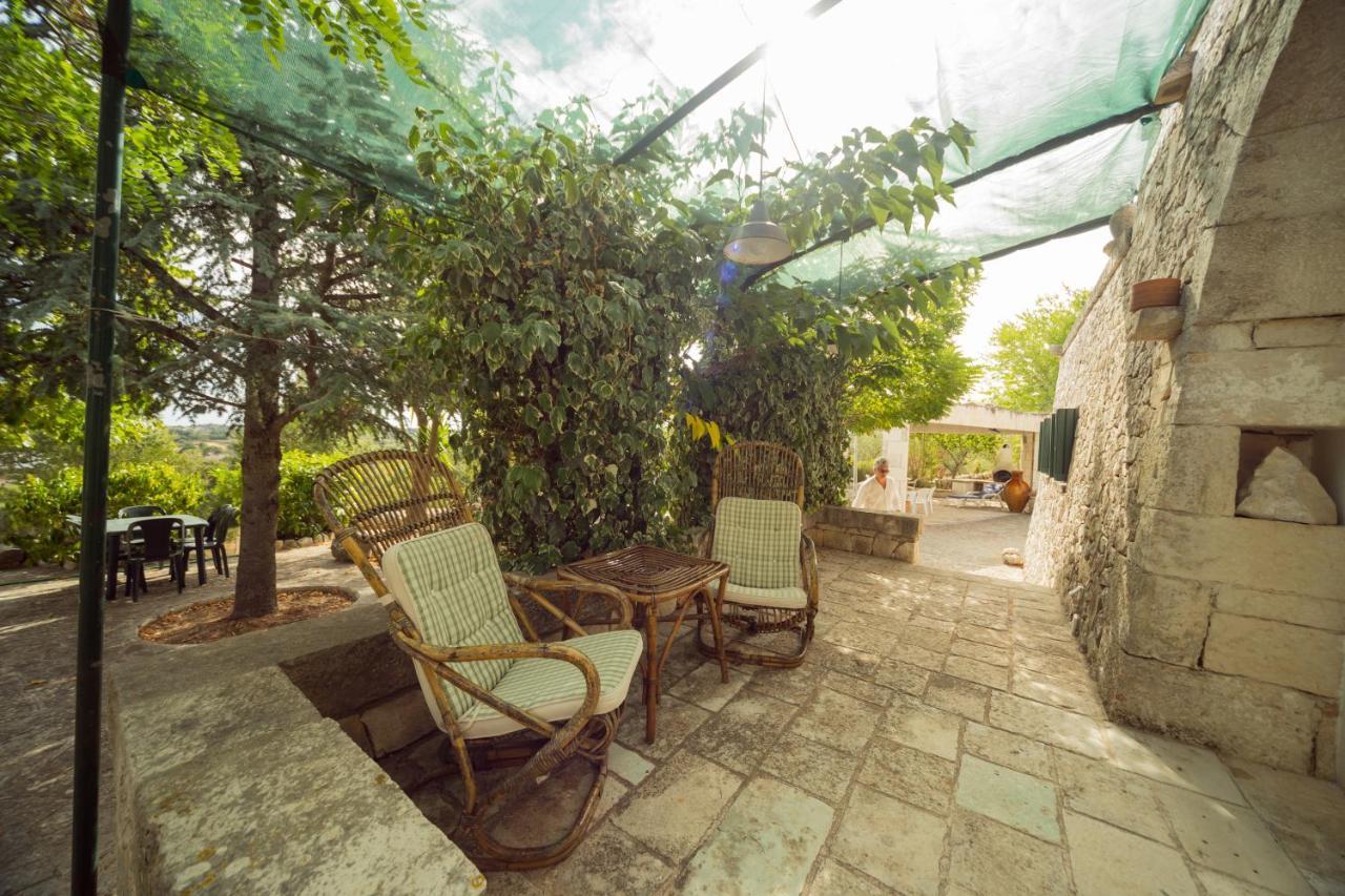 Trulli Girasoli E Viole Cocolicchio Extérieur photo