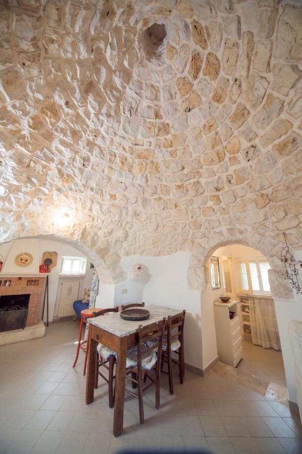 Trulli Girasoli E Viole Cocolicchio Extérieur photo