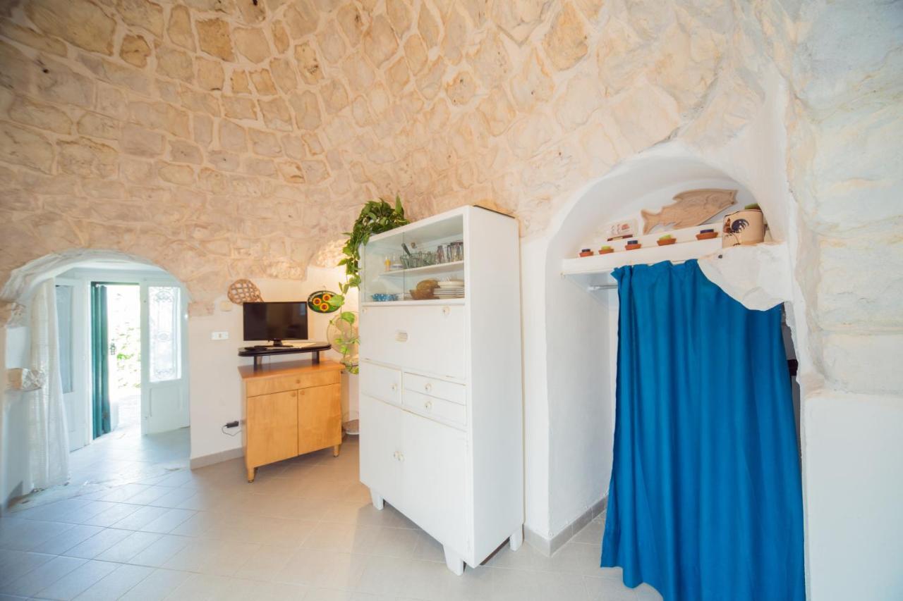 Trulli Girasoli E Viole Cocolicchio Extérieur photo